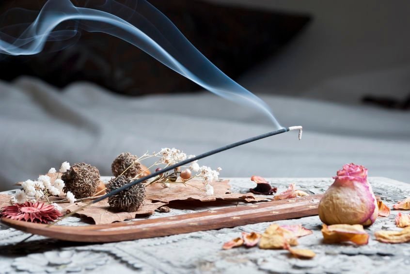 Picture of an incense stick burning with natural ingredients